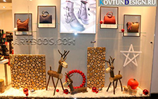 Арт-инсталляция «Северные олени» в витрине магазина (Новогодние арт-композиции для оформления витрины)