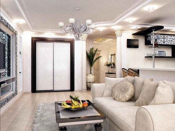 Шкаф в смежной гостиной-прихожей должен не только стильно дополнять интерьер помещения, но и быть функциональным и практичным