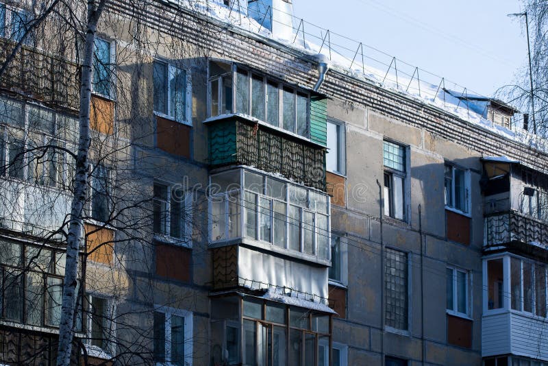 Detail of old five-story building on the outskirts royalty free stock photo