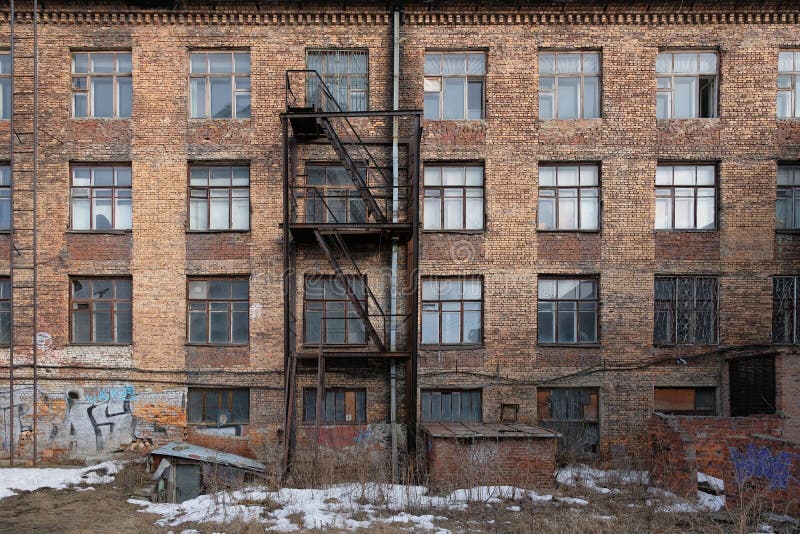 Old brick multi-storey building stock images