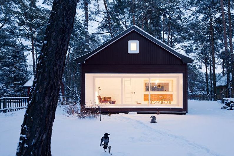 Черный загородный дом в скандинавском стиле - фото